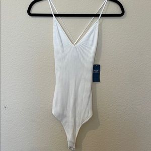 White body suit with open back